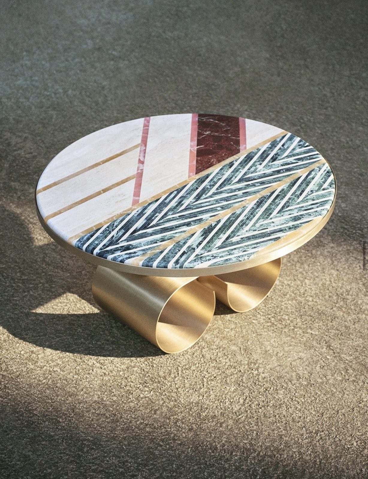 Marble and brass coffee table with a herringbone inlay